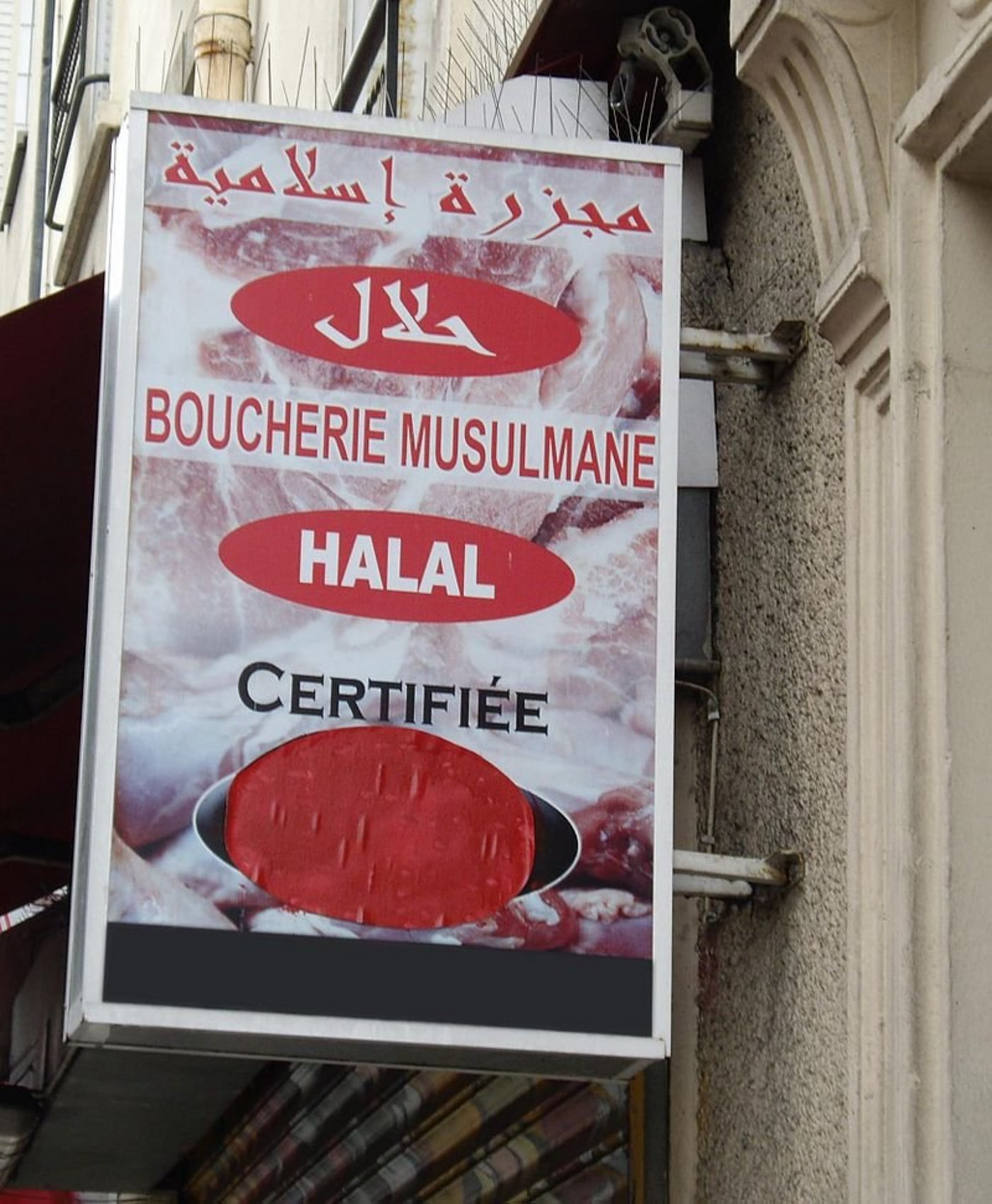 Schild einer Halāl-Metzgerei in Paris. (Bild Mu)